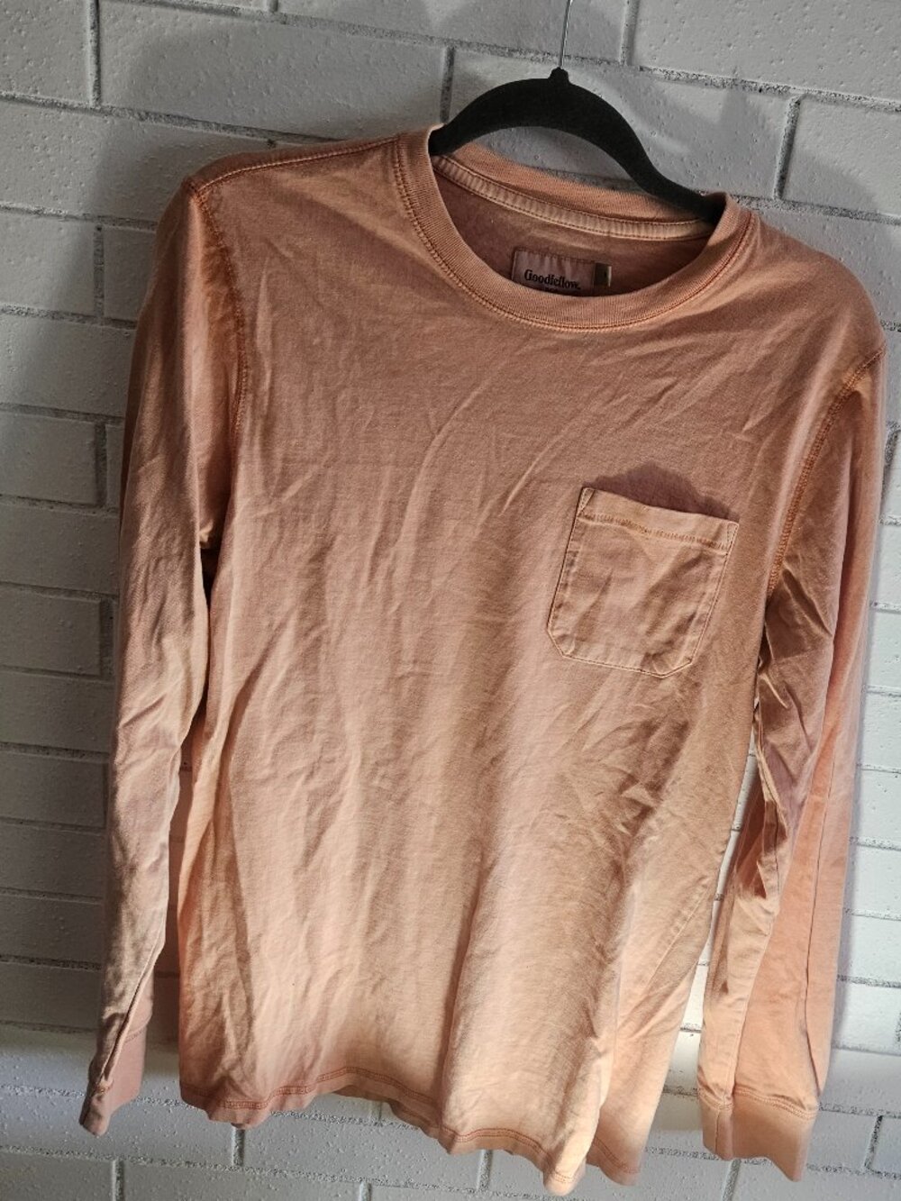 Goodfellow Lt. Pink/coral colored Long Sleeve pocket t-shirt. Coral color size M